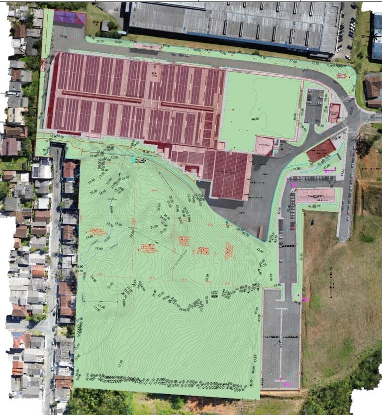 Aerial map view of agricultural facility with greenhouses, storage buildings, and surrounding residential area